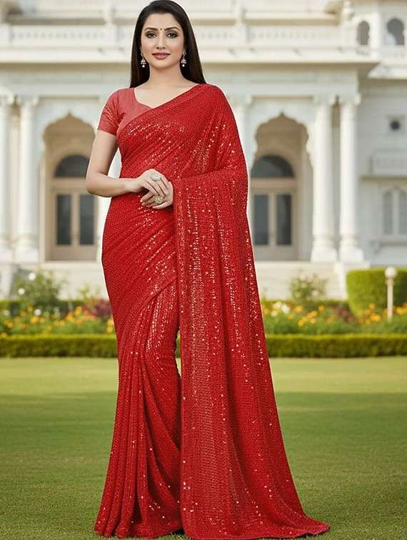 women solid with work embellished saree with blouse