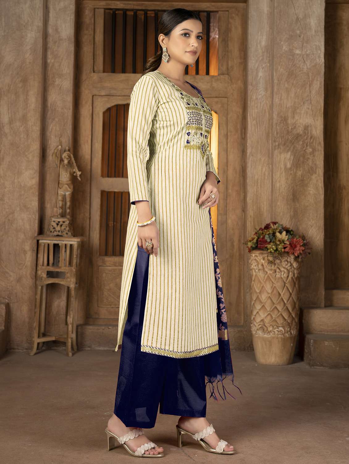 women striped unstitched suit set - 22429830 -  Standard Image - 2