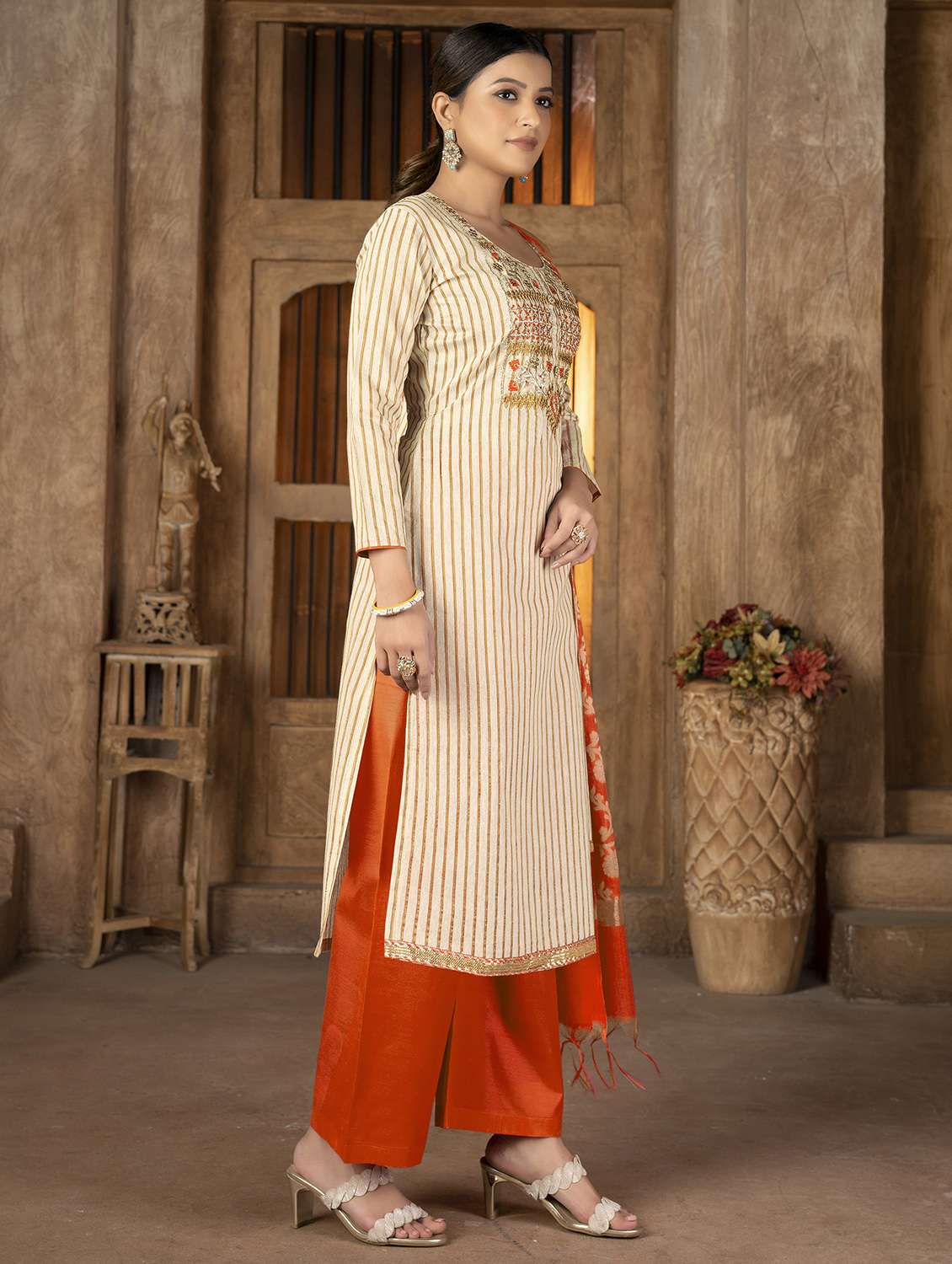 women striped unstitched suit set - 22429831 -  Standard Image - 2