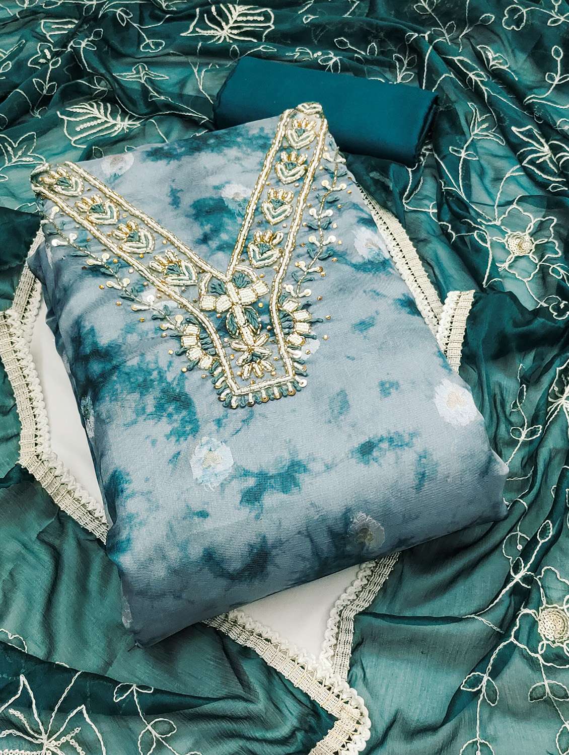 women printed unstitched suit set