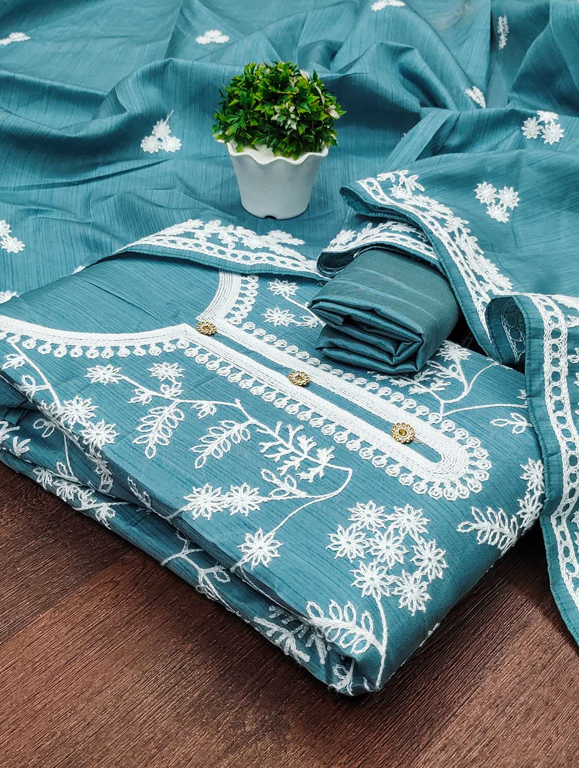 women solid with work unstitched suit set