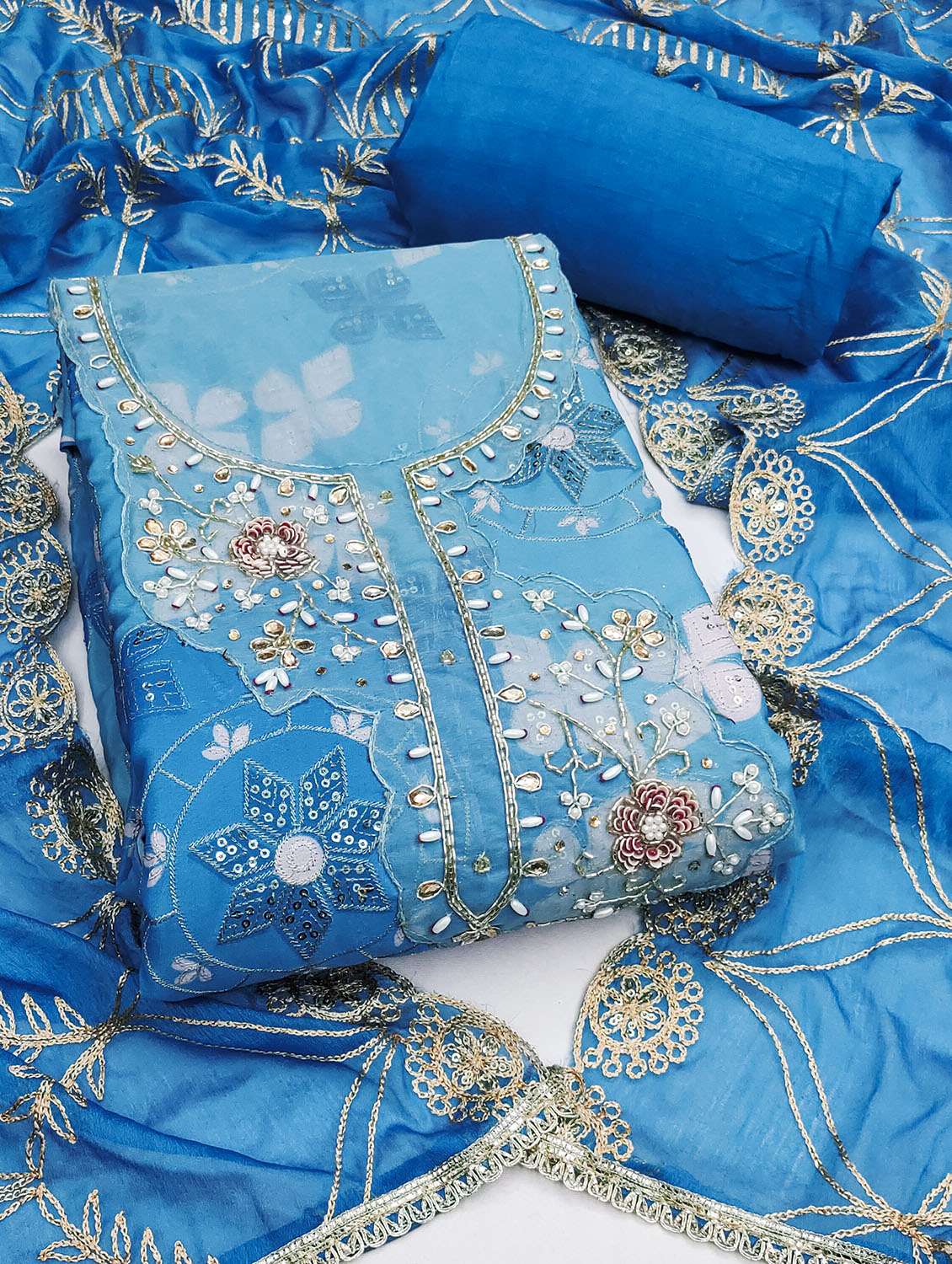 women printed unstitched suit set