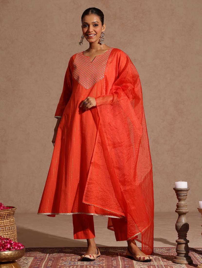women orange kurta dupatta set