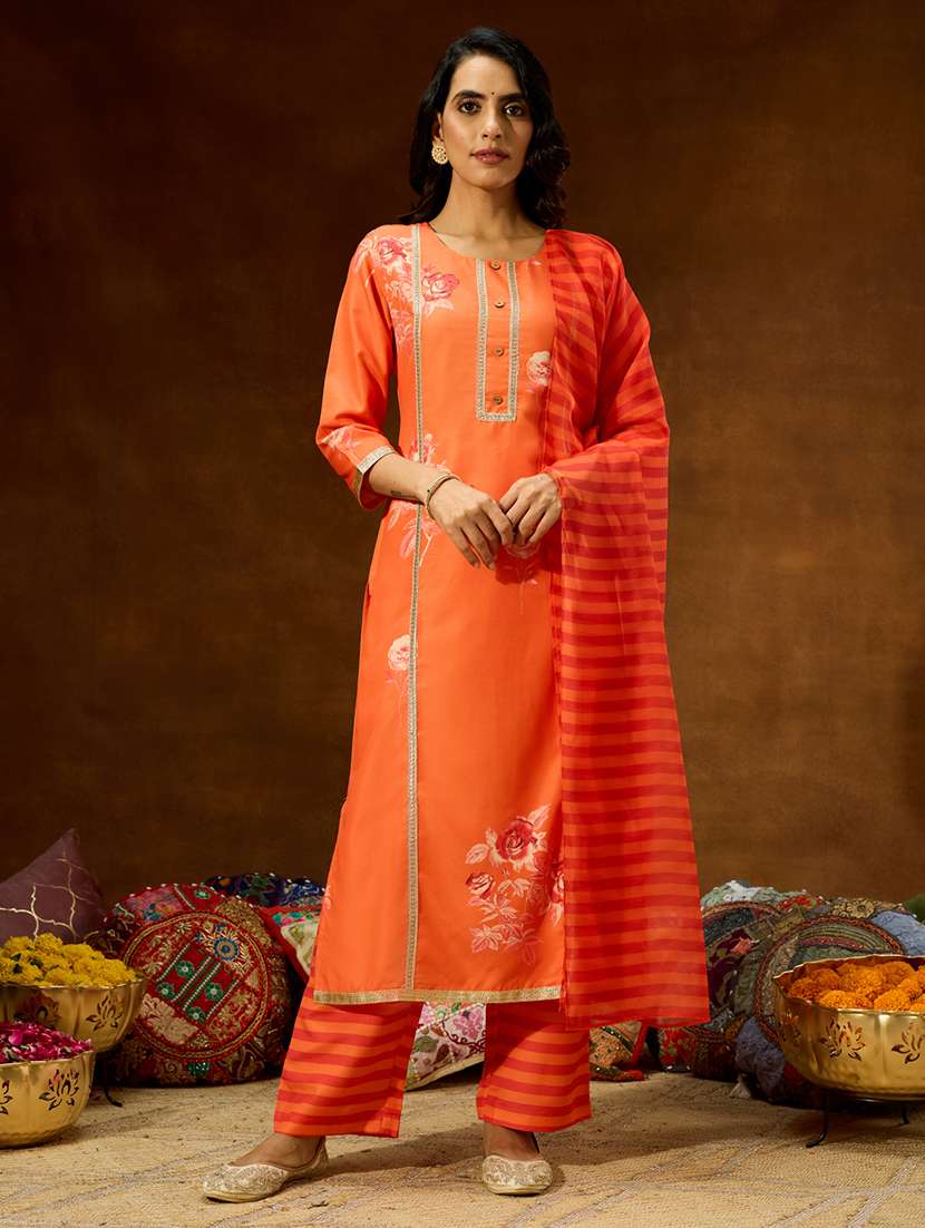 women orange kurta dupatta set