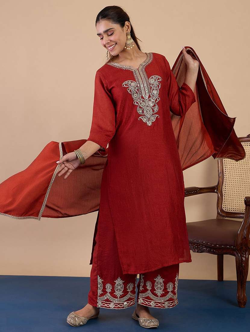 women orange kurta dupatta set