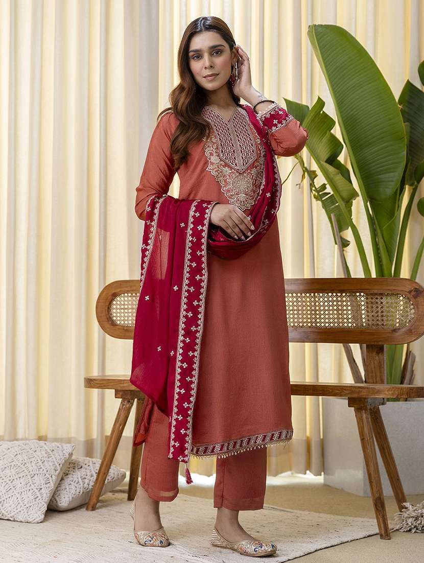 women orange kurta dupatta set