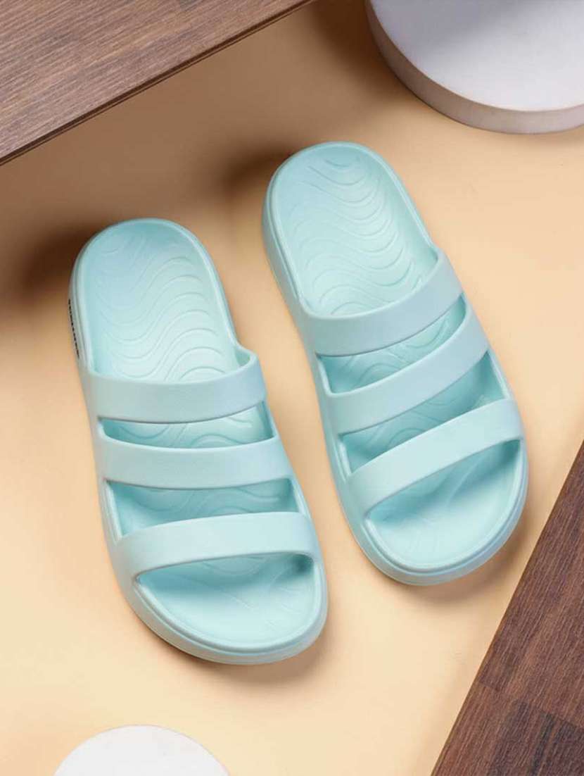 women blue slip on sandal