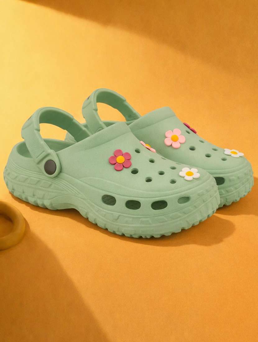 women green solid clogs