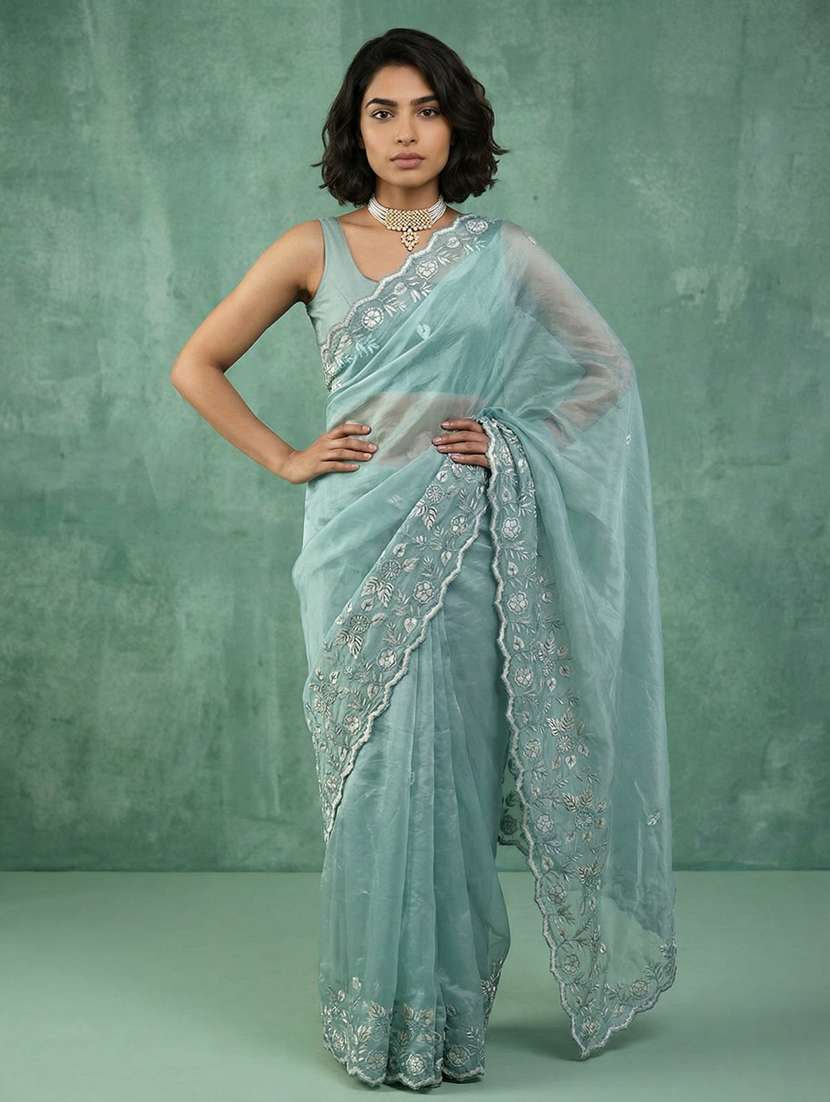 women solid with work embroidered saree with blouse