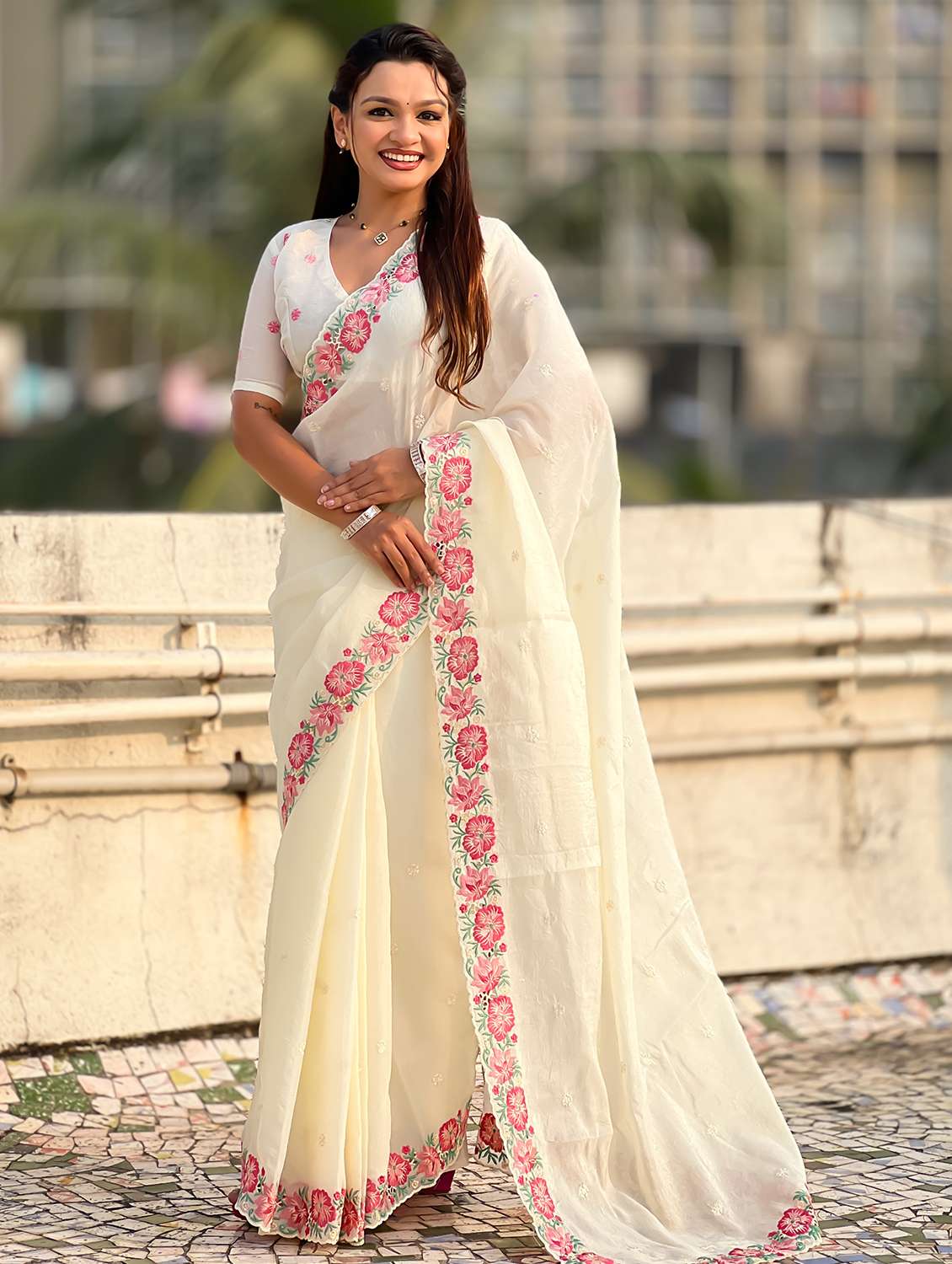 women solid with work embroidered saree with blouse