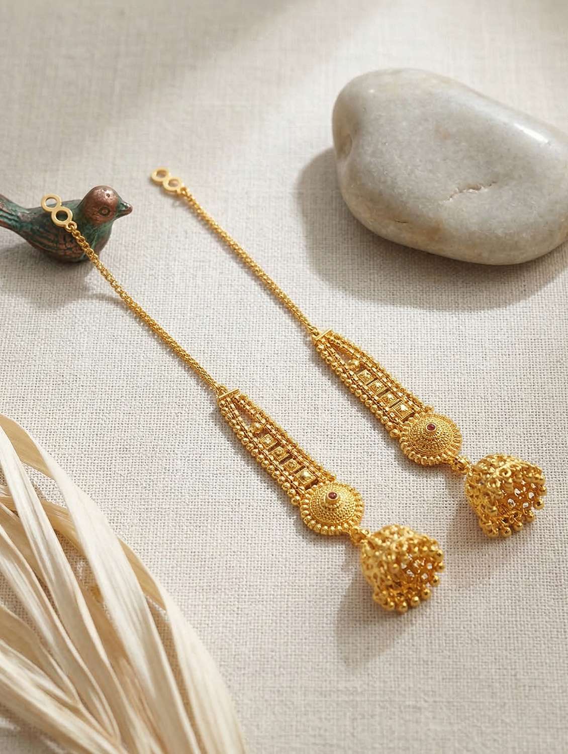 women gold brass jhumka earring