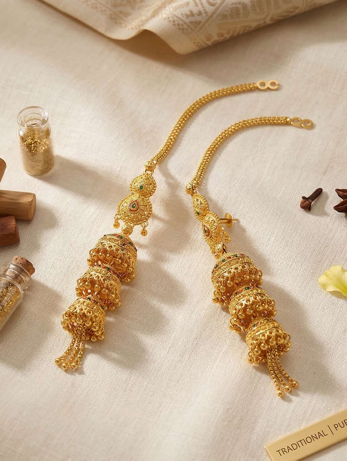 women gold brass jhumka earring