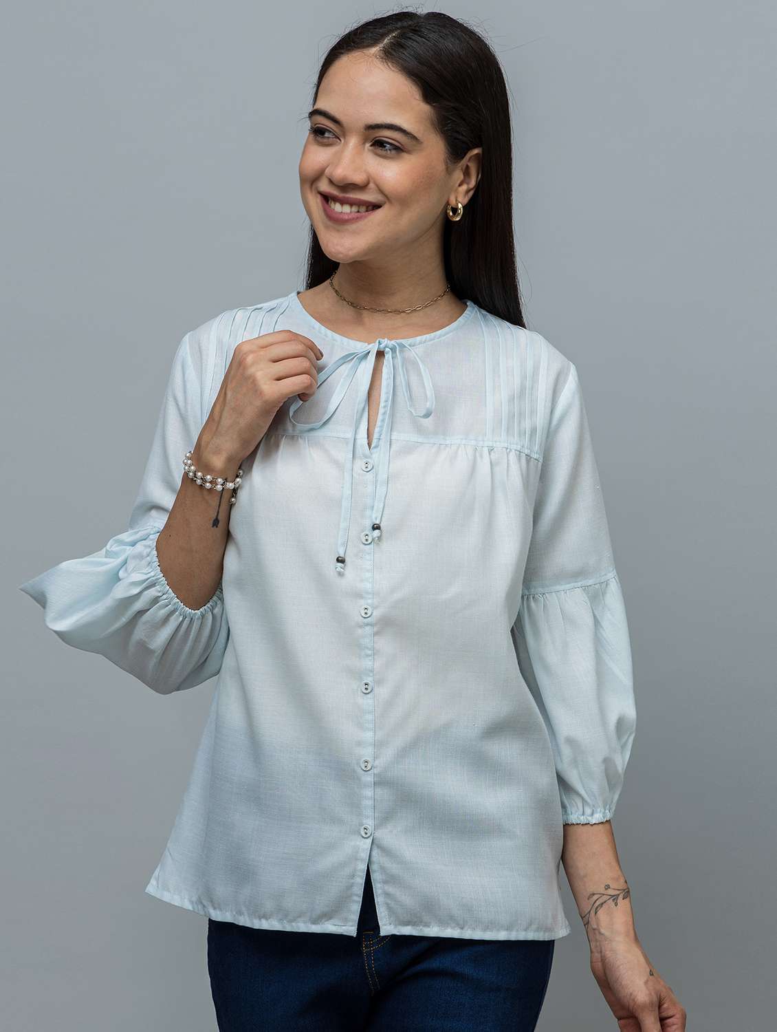 women solid blue linen regular top
