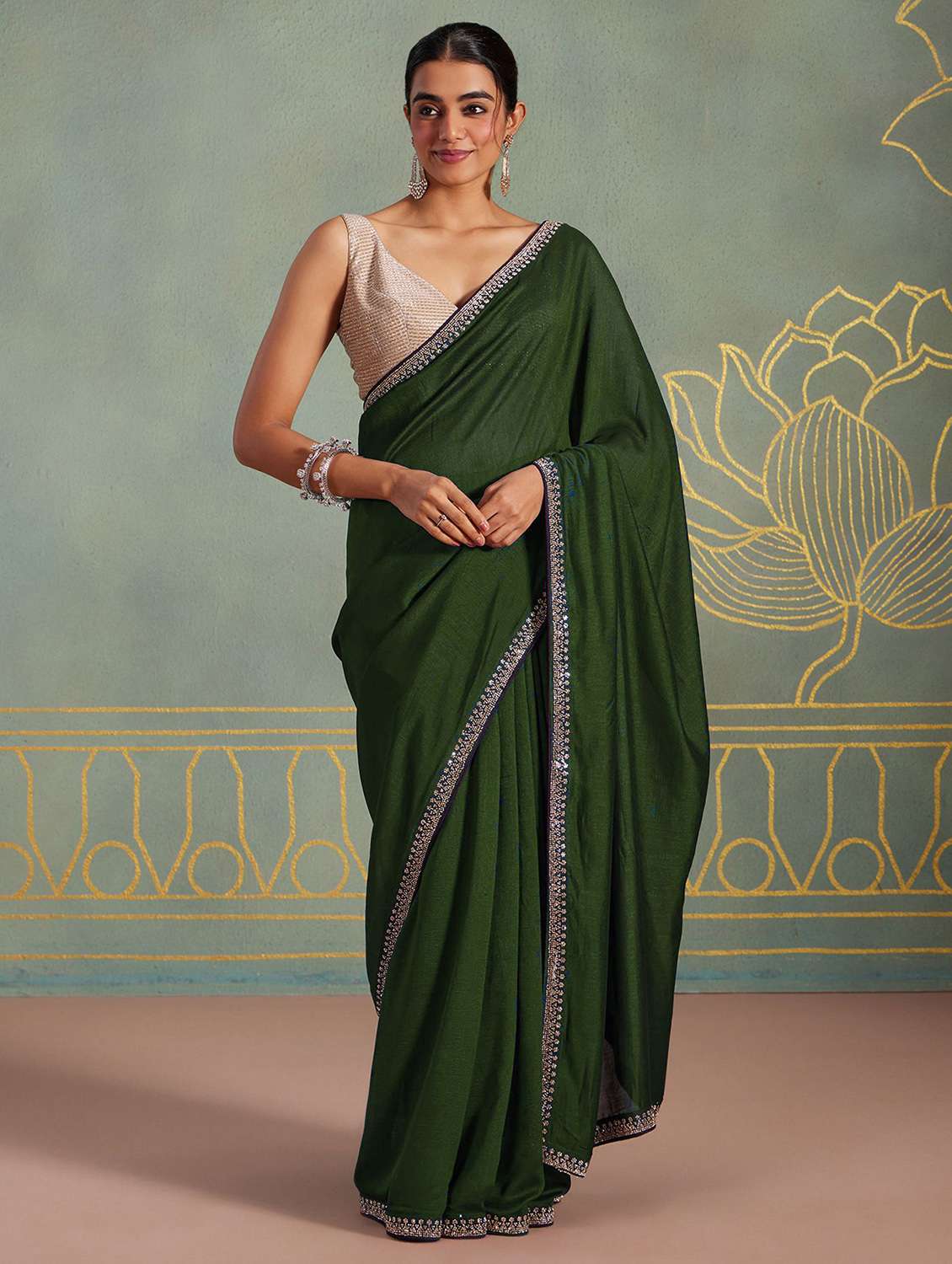 women solid with embellished bordered saree