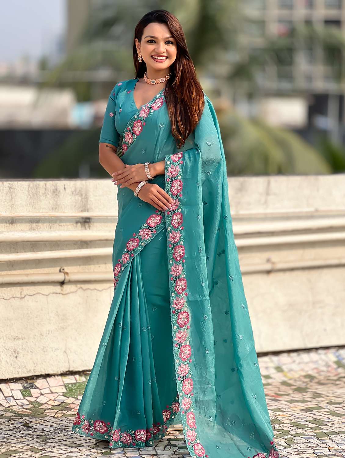 women solid with work embroidered saree with blouse