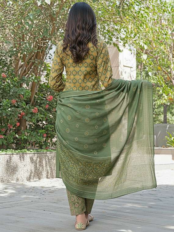 women green suit set - 22453957 -  Standard Image - 2