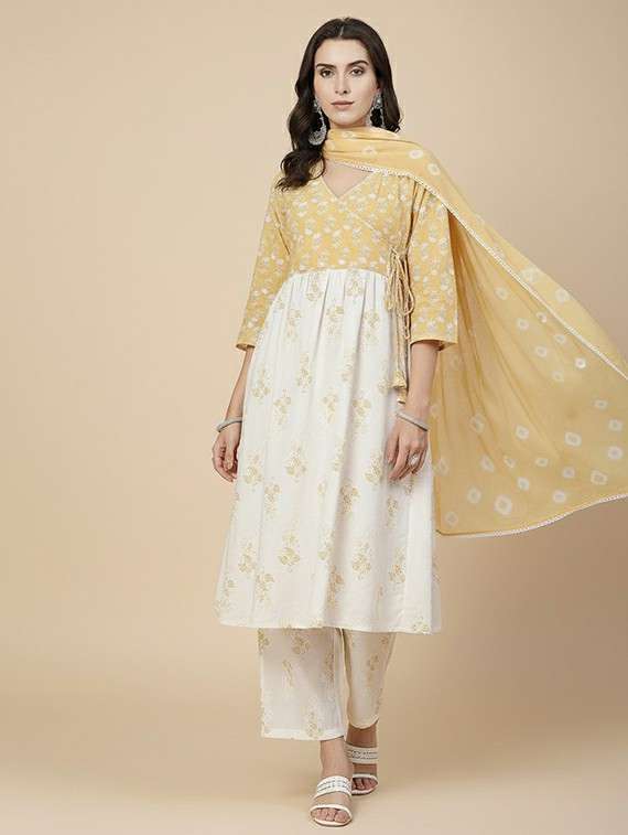 women off white suit set - 22454008 -  Standard Image - 2