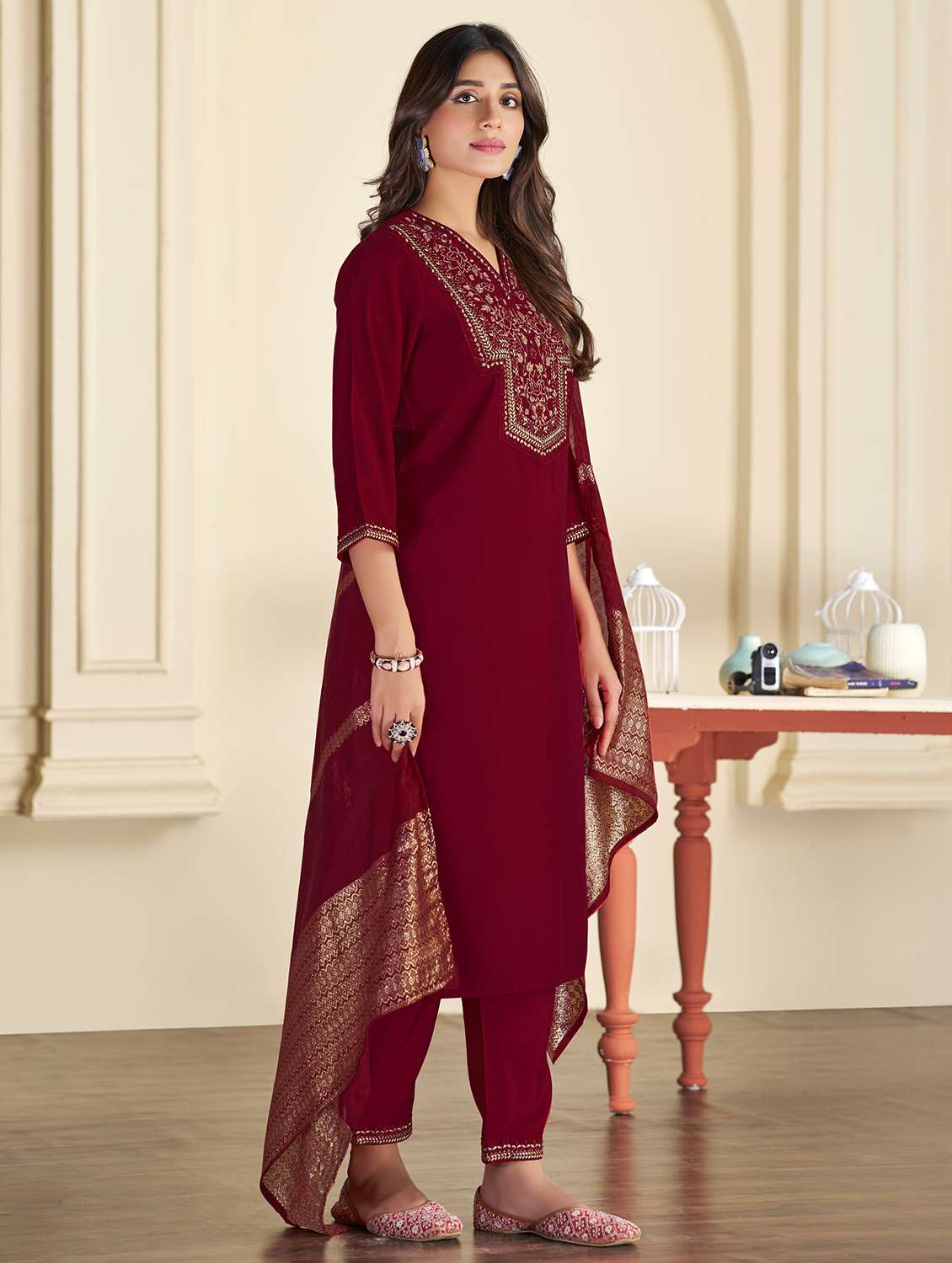women maroon suit set - 22454018 -  Standard Image - 2