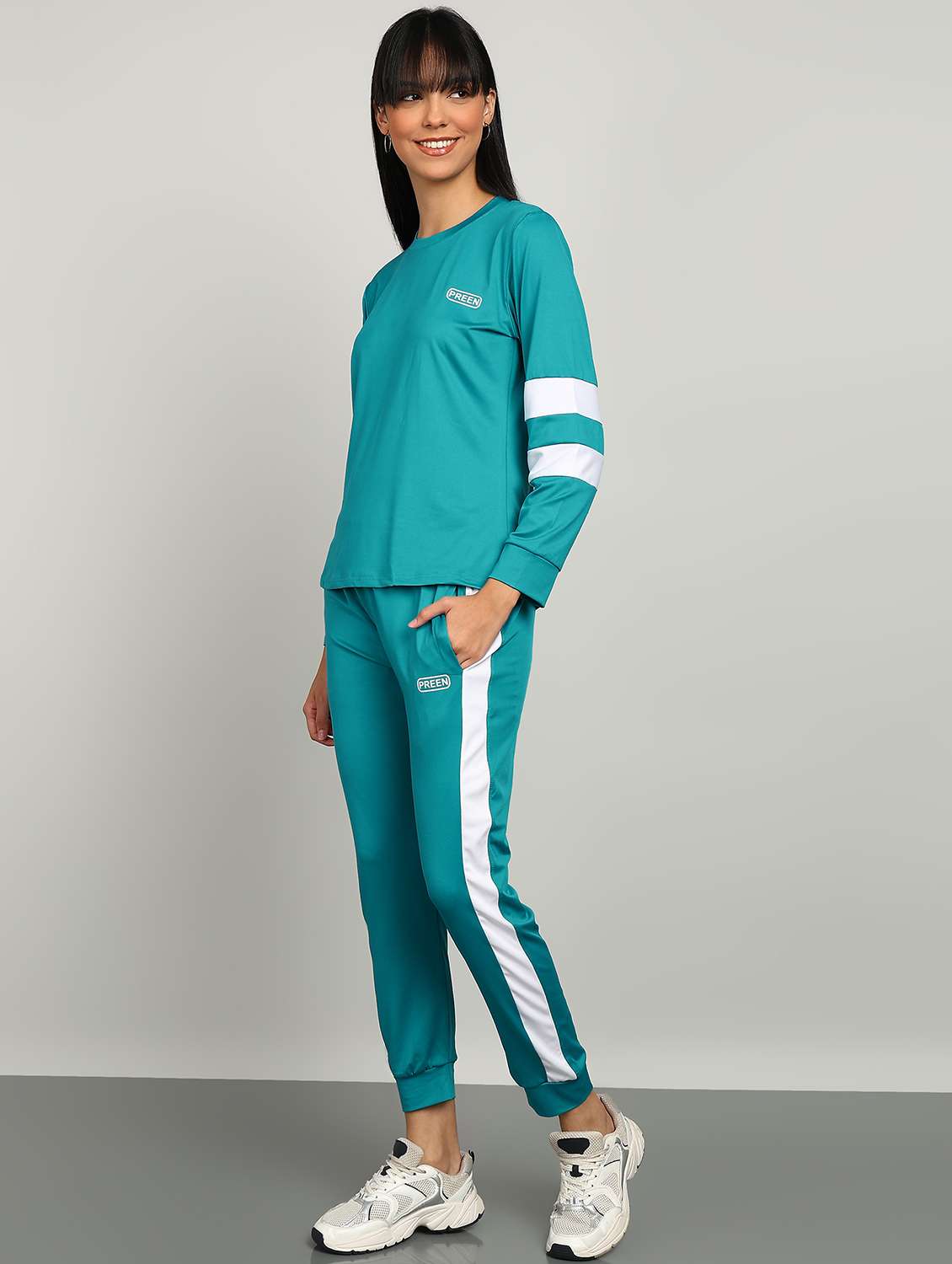 women green polyester active wear set with sleeves - 22456711 -  Standard Image - 2