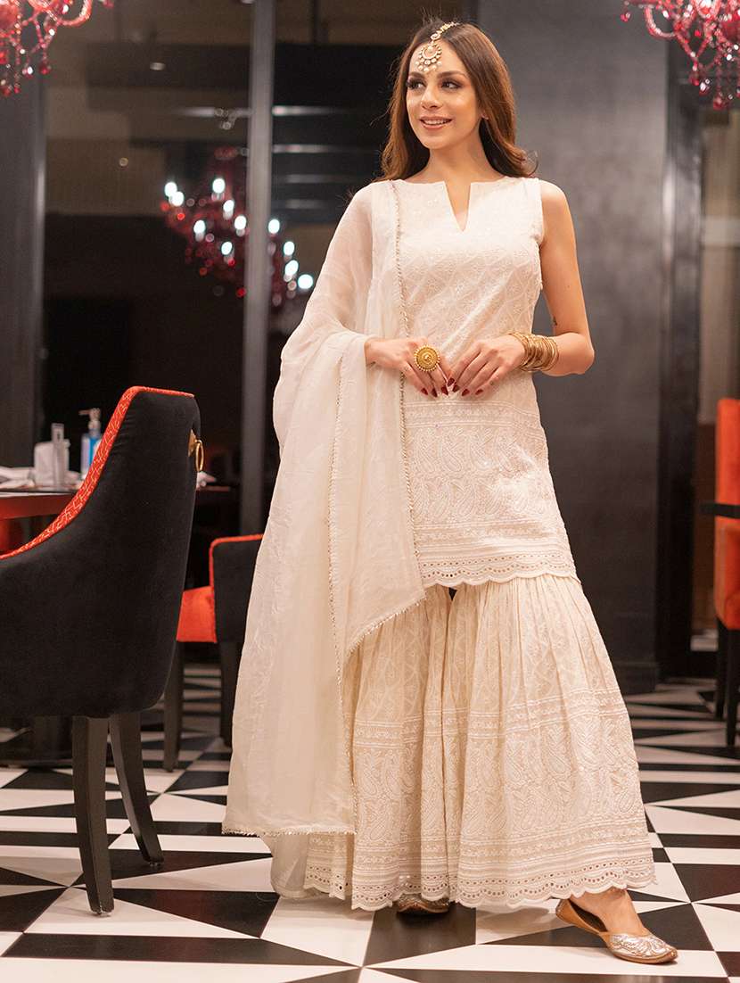 women off white suit set - 22471640 -  Standard Image - 2