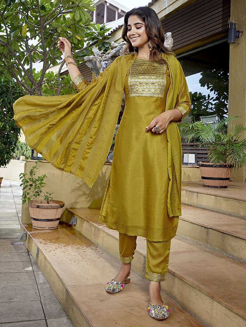 women mustard suit set - 22471663 -  Standard Image - 2