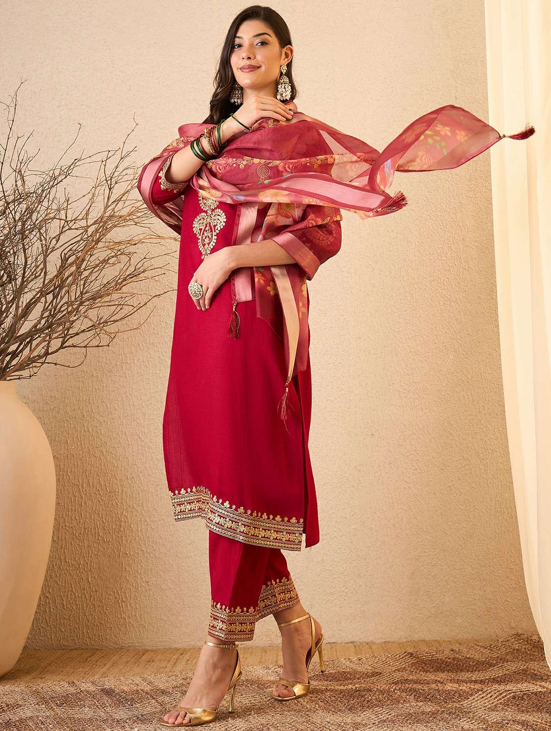 women maroon suit set - 22471737 -  Standard Image - 2