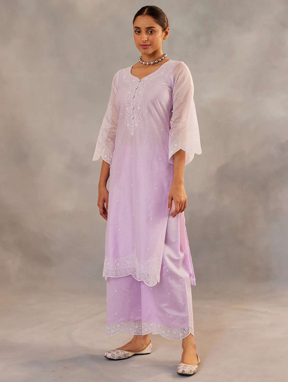 women lavender suit set - 22471759 -  Standard Image - 2