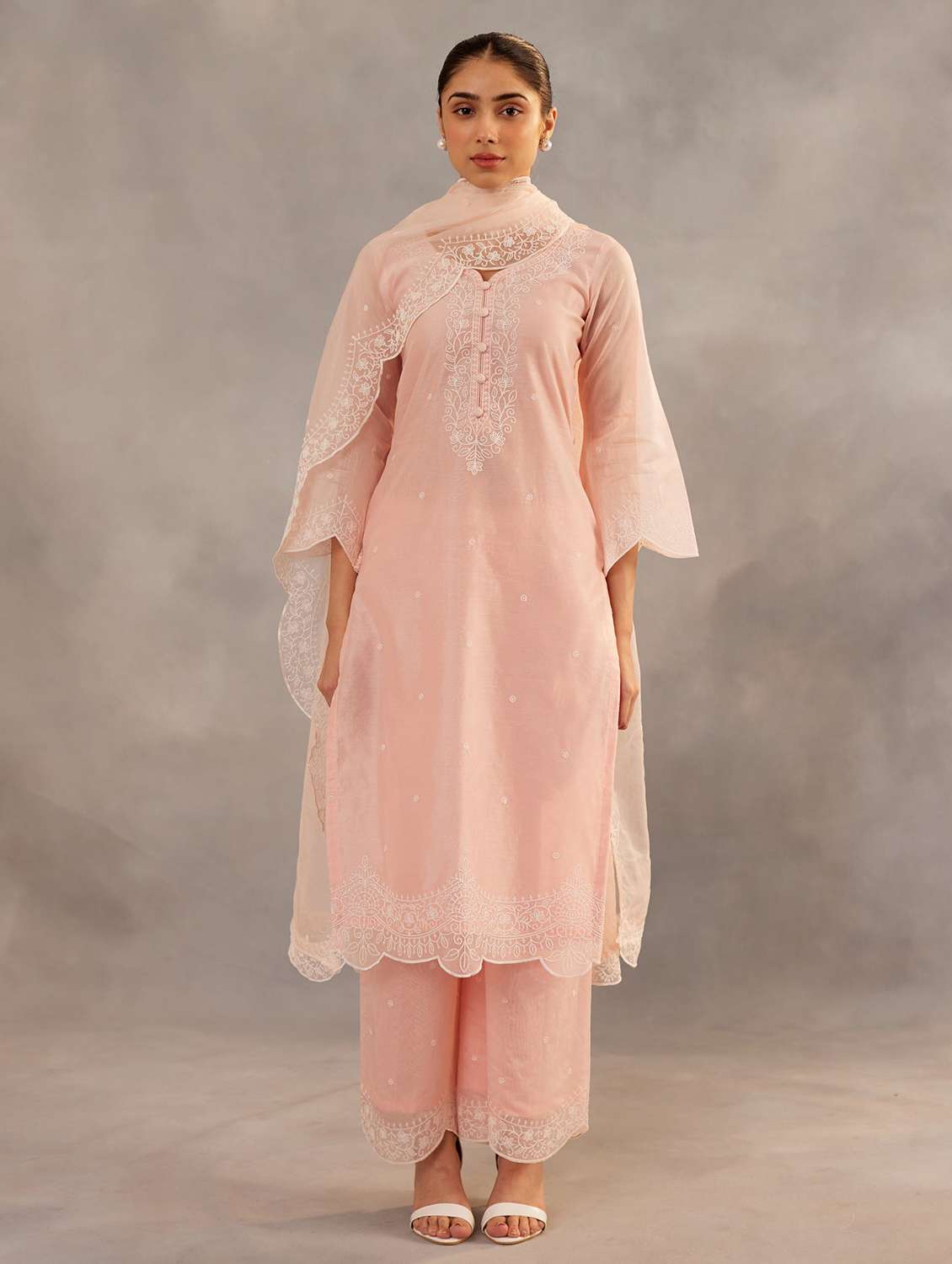 women pink suit set - 22471761 -  Standard Image - 2