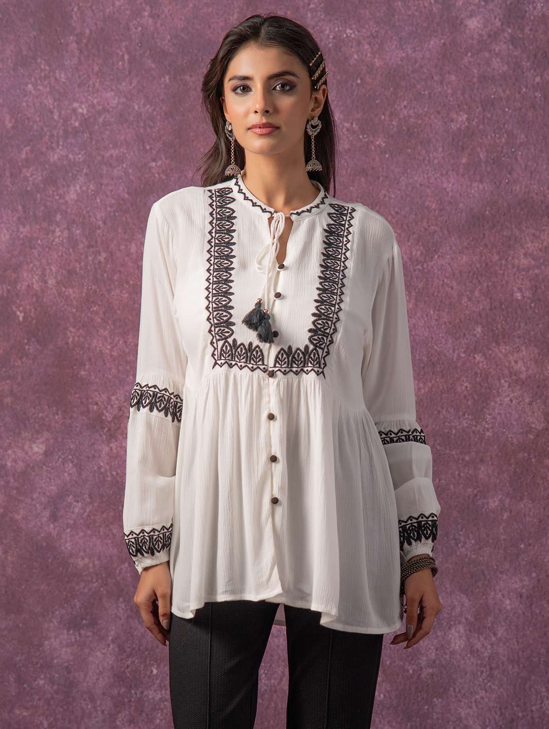 women embroidered tie up neck flared tunic