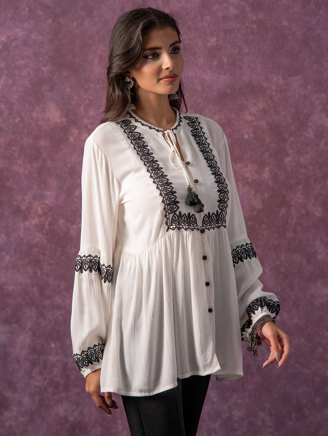 women embroidered tie up neck flared tunic - 22473248 -  Standard Image - 2