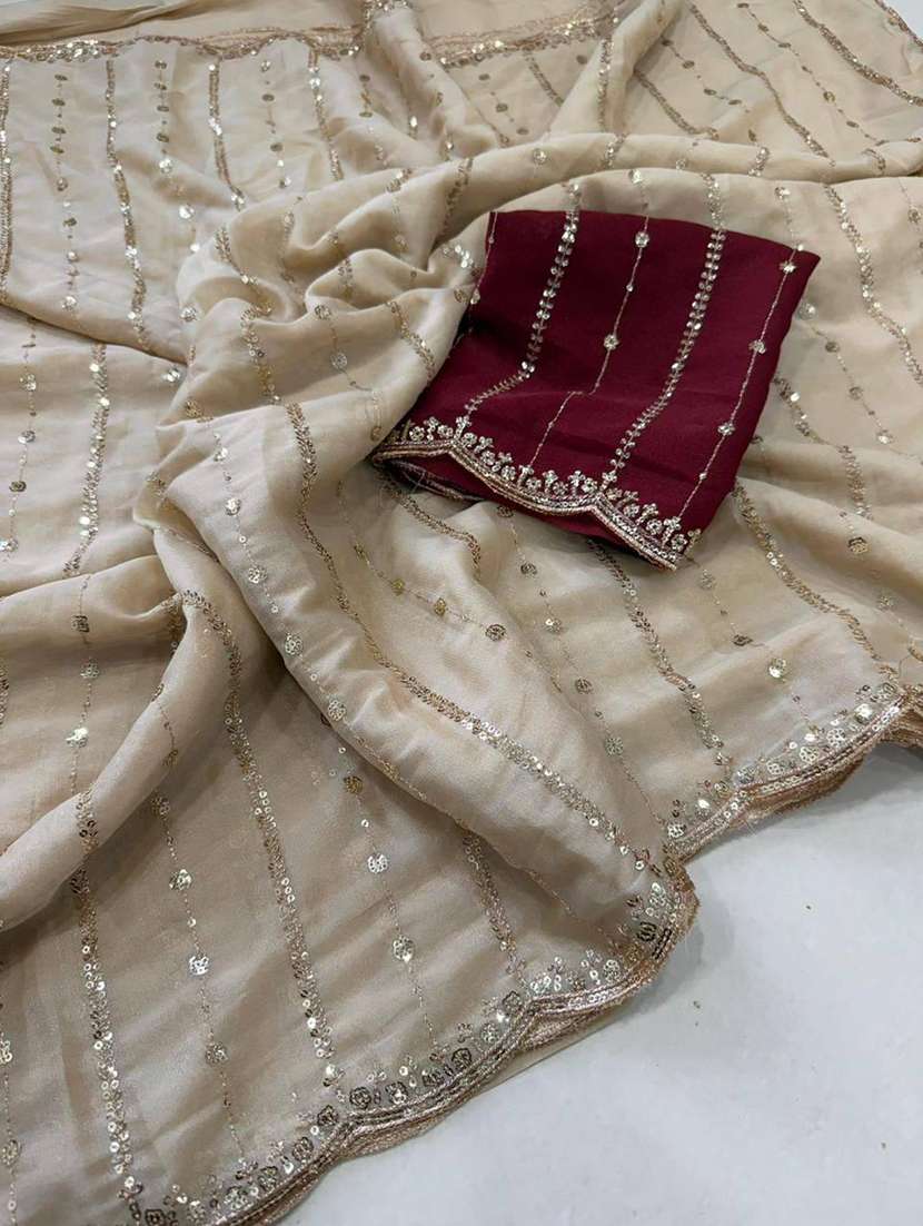 women embroidered saree with attached blouse with blouse - 22473661 -  Standard Image - 2