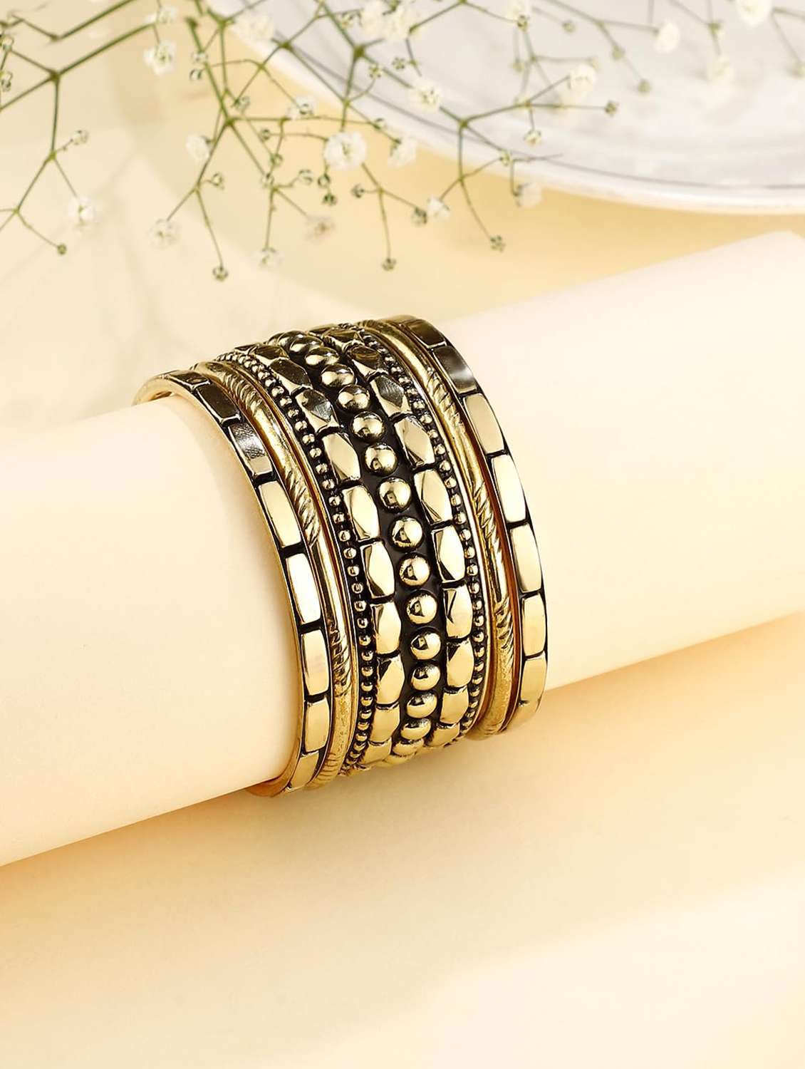 gold-toned textured bangle set for women set of 5