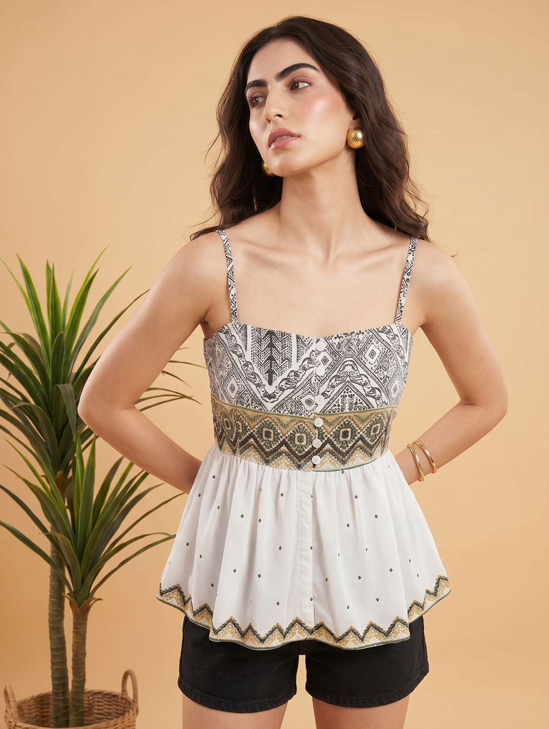 women embroidered sleeveless peplum top - 22499459 -  Standard Image - 2