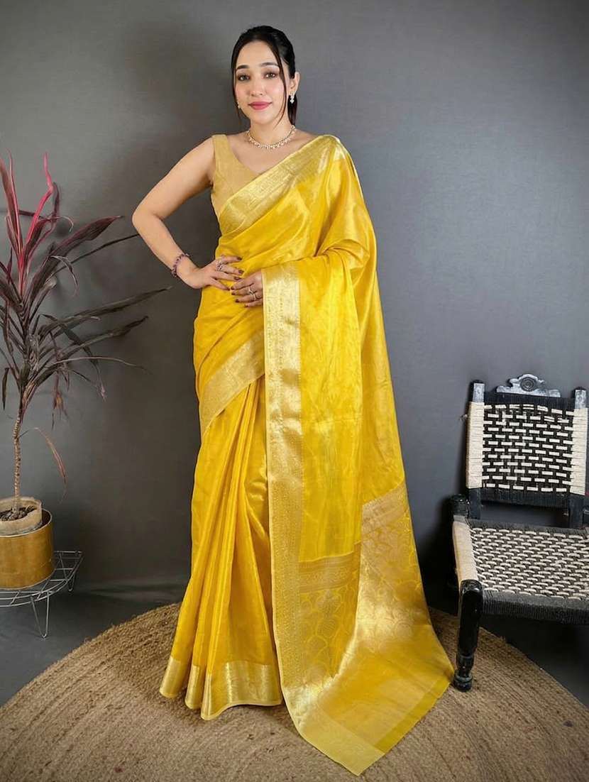 women solid with bordered saree with blouse