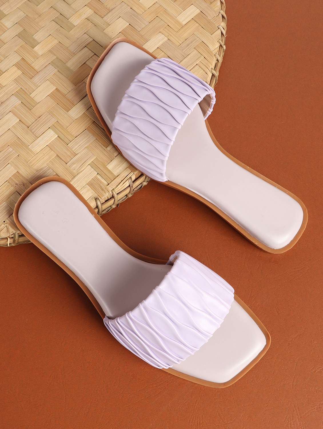 women textured slip on sandal