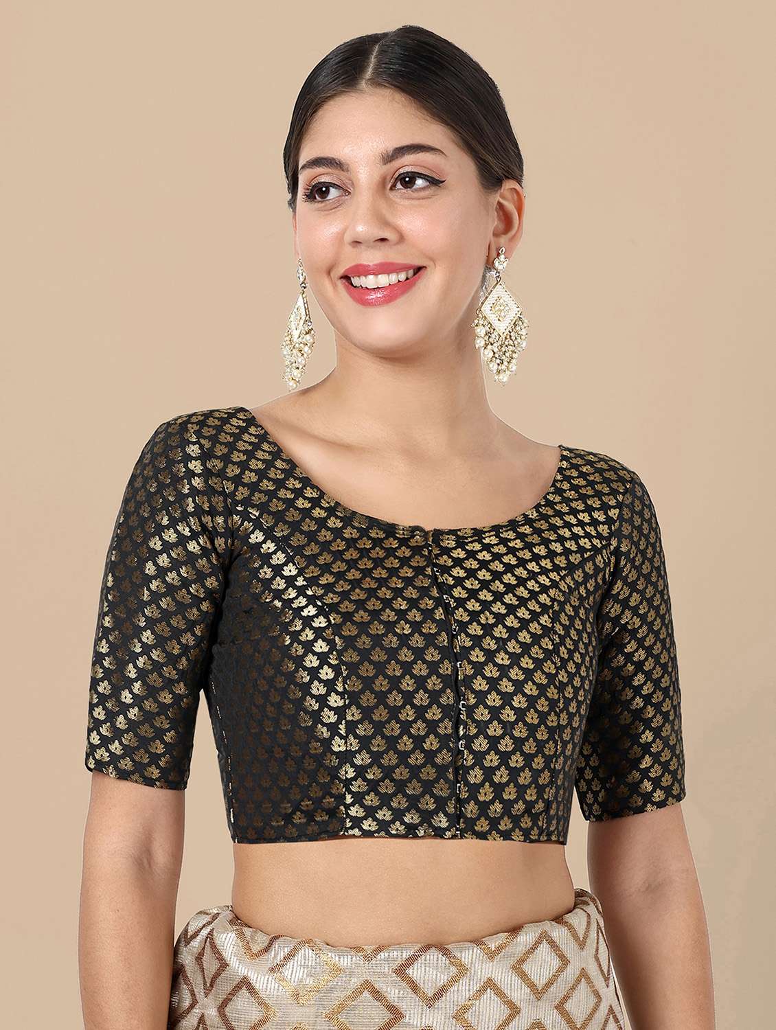 women self design round neck stitched blouse