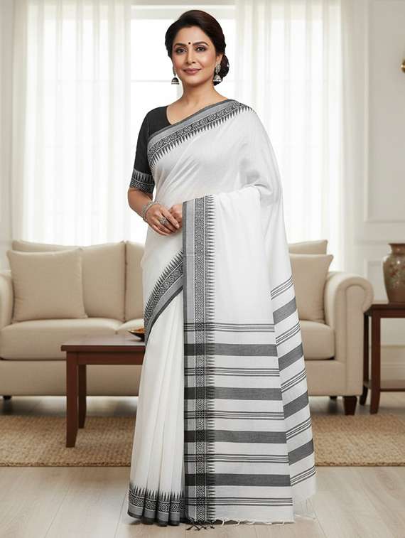 women solid with bordered handloom saree with blouse
