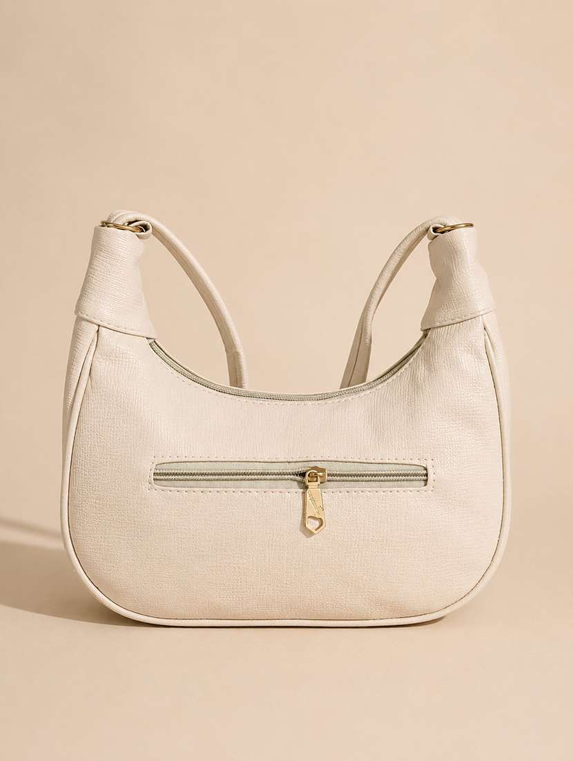 beige textured sling bag - 22518304 -  Standard Image - 2