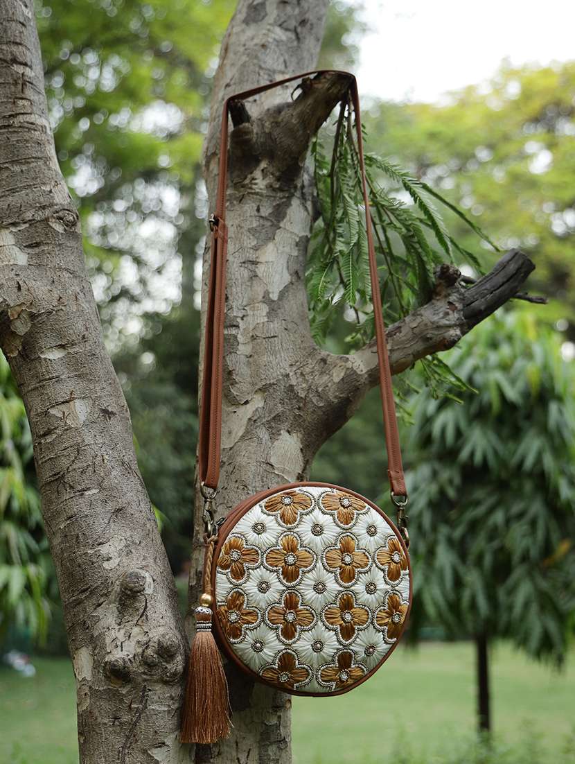 tan floral embellished cotton sling bag with zip closure