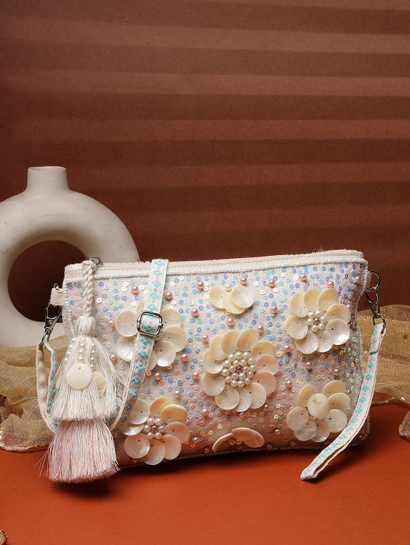 off white floral embellished canvas sling bag with zip closure