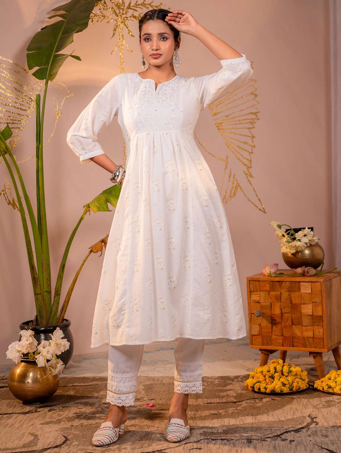women embroidered three quarter sleeves a-line kurta
