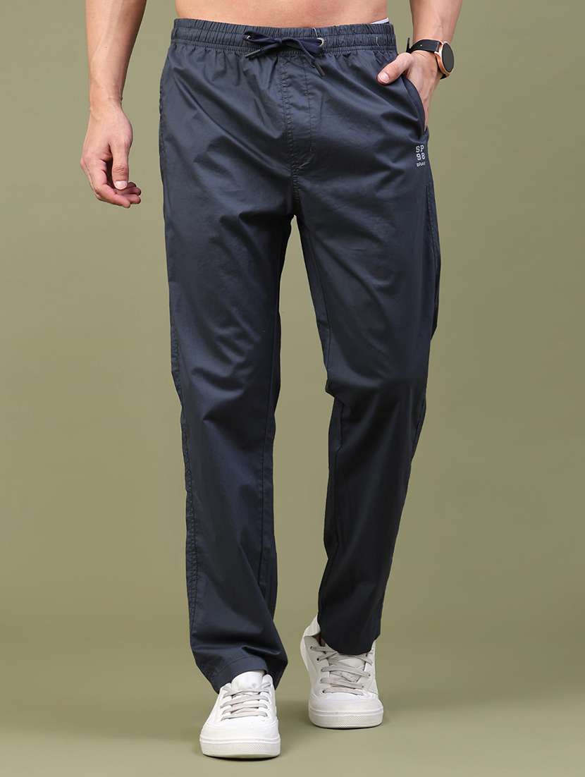 men solid mid rise flat front casual trouser