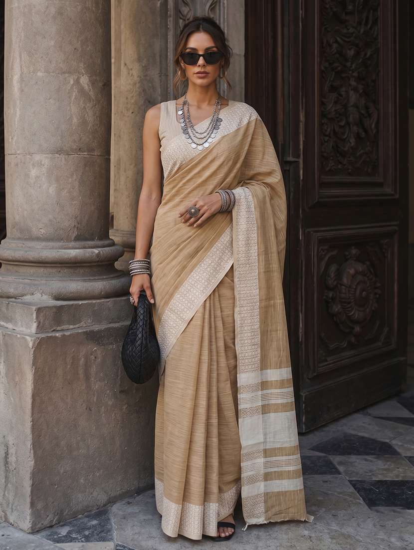 women solid with bordered saree with blouse