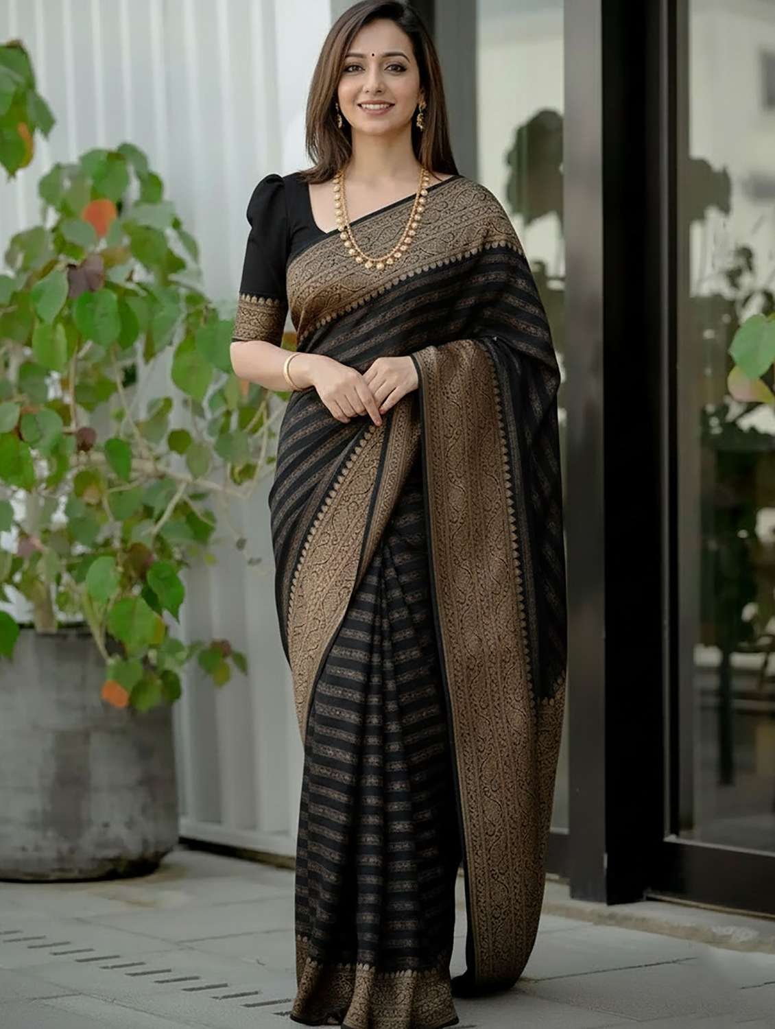 women self design banarasi saree with blouse