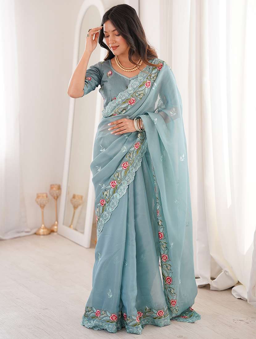 women solid with work embroidered saree with blouse