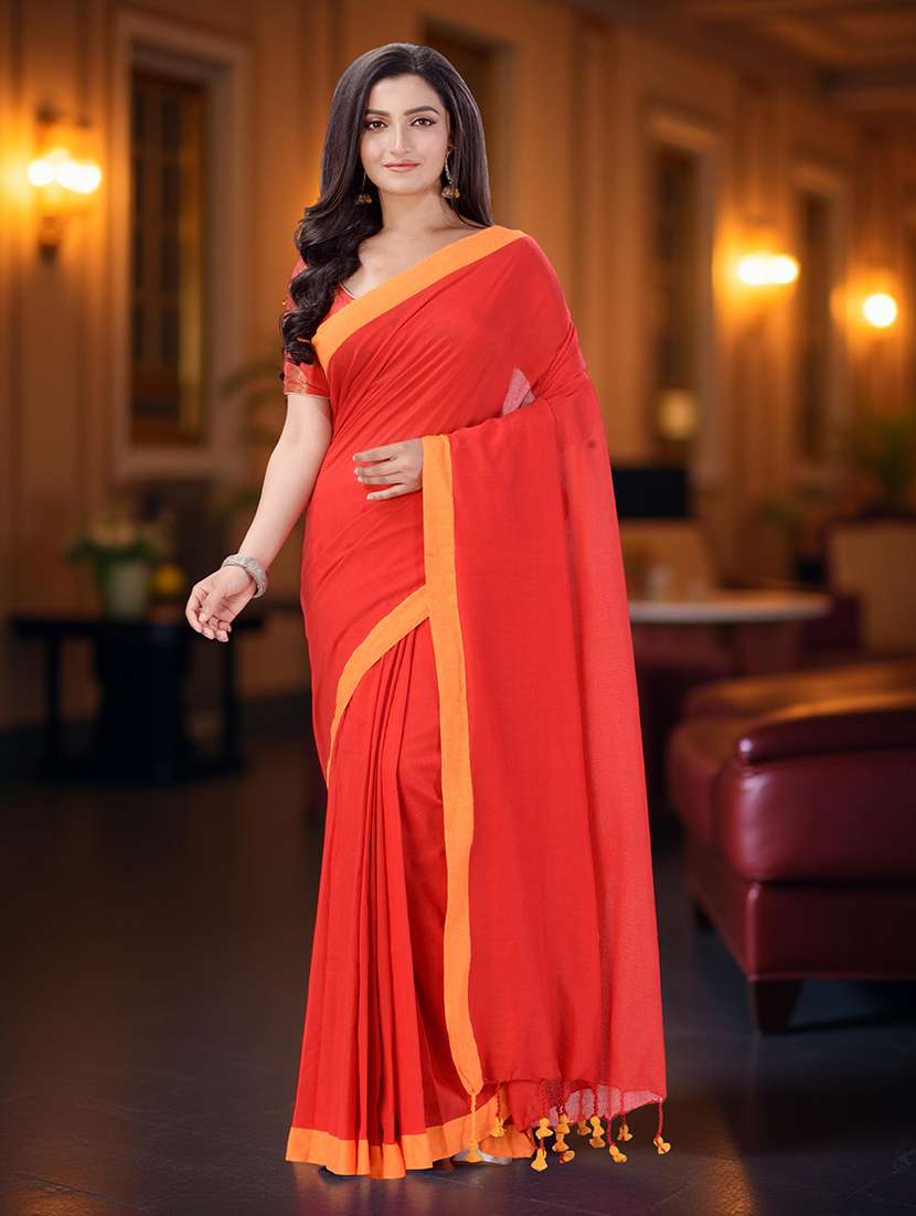 women solid with bordered handloom saree