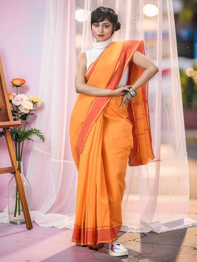 women solid with bordered handloom saree