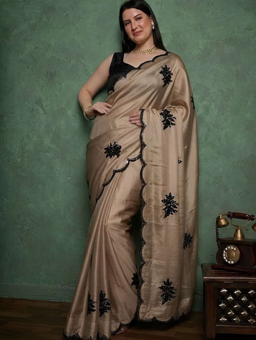 women solid with work embroidered saree with blouse