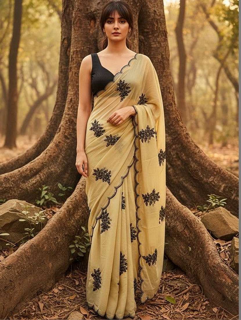 women solid with work embroidered saree with blouse