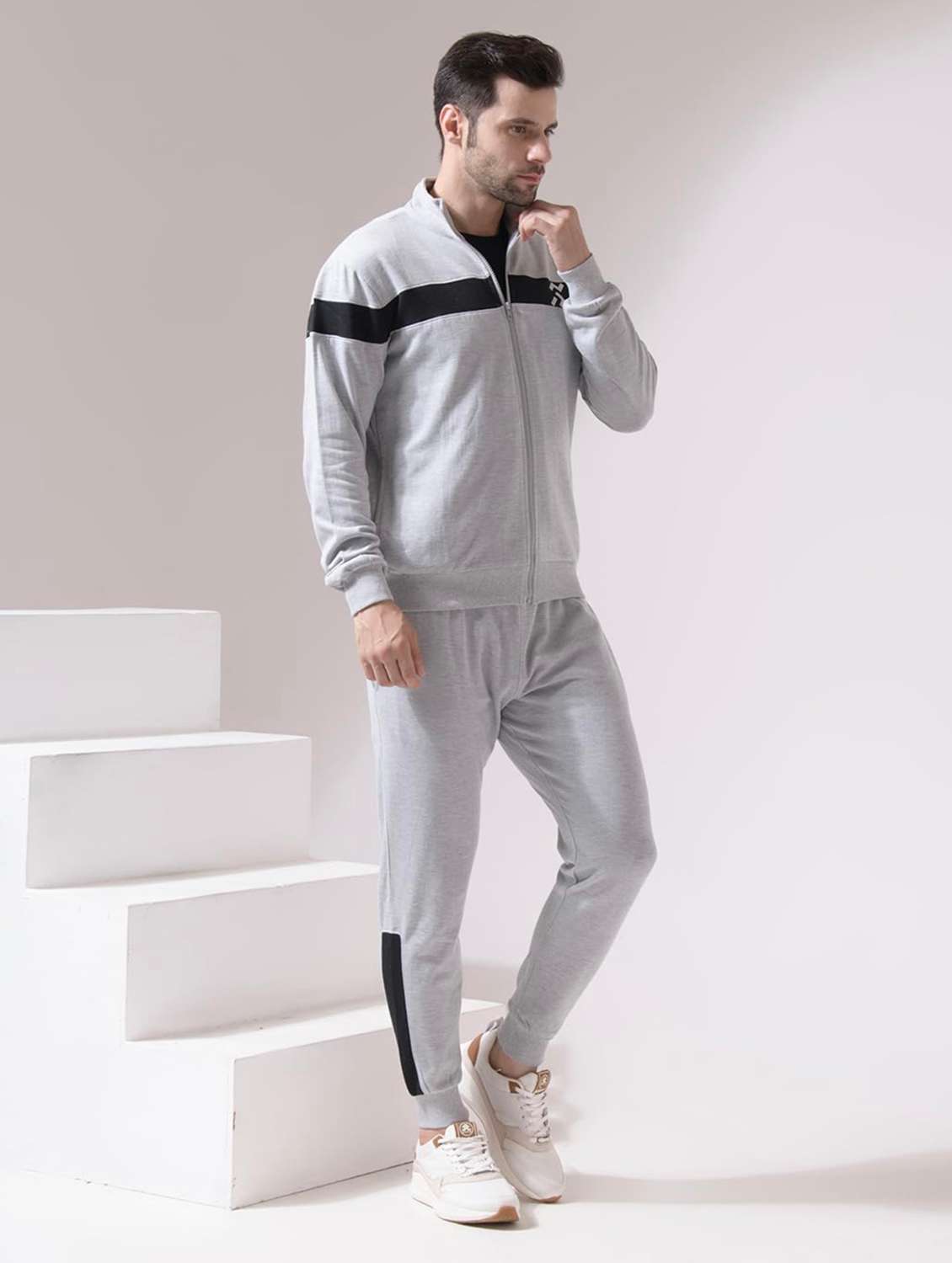 men taped long sleeves track suit - 22582219 -  Standard Image - 2